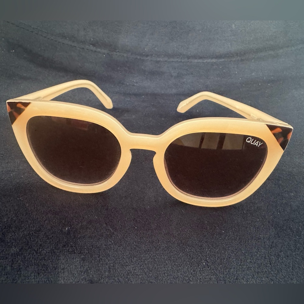 Quay Australia light pink Sunglasses with tortoise accents.
